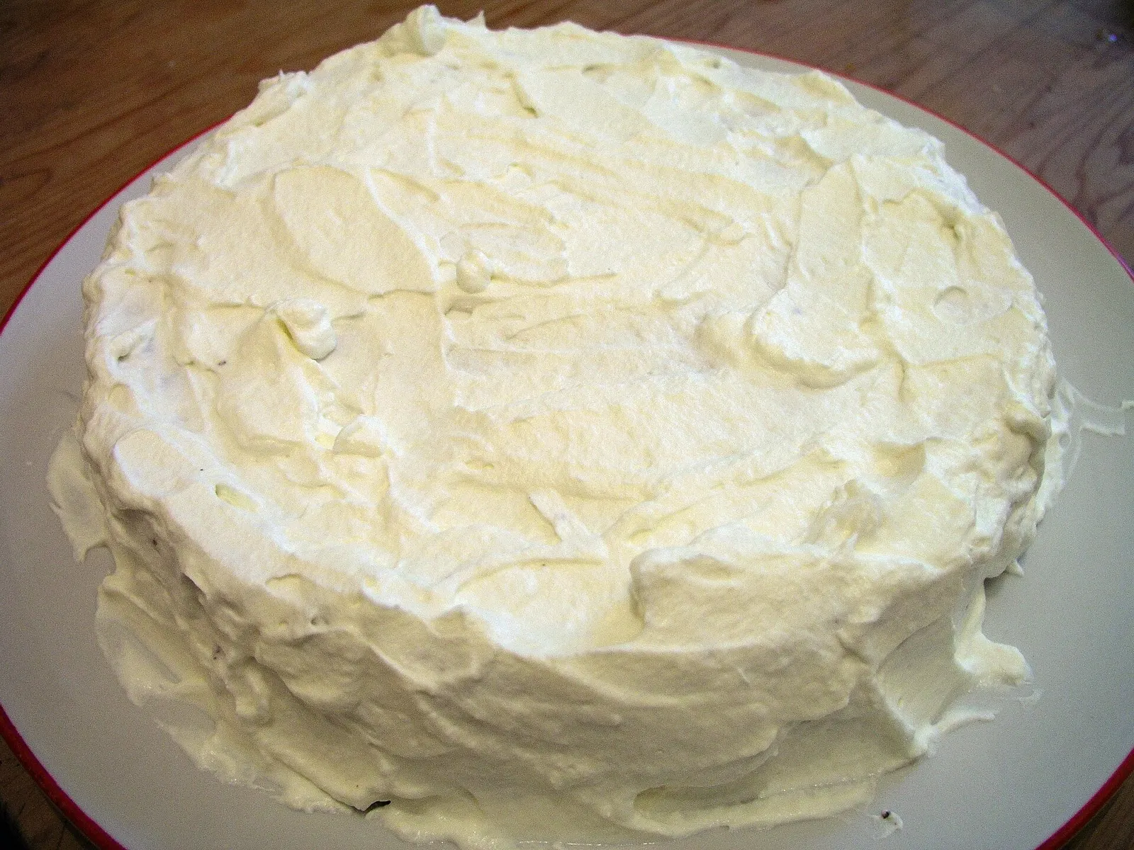 A layered cake with cream