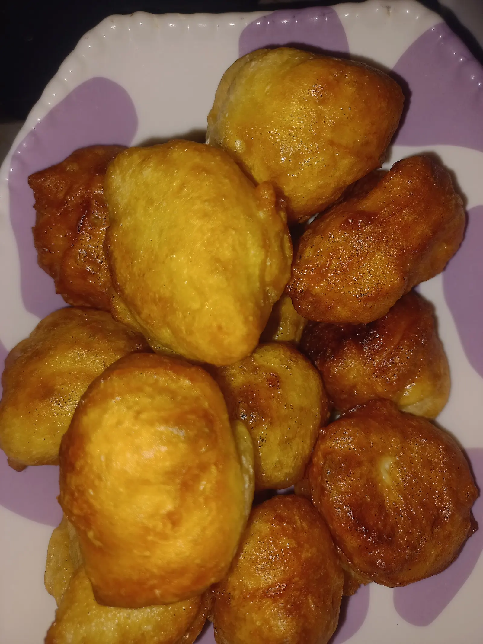 A bowl of freshly fried puff puff